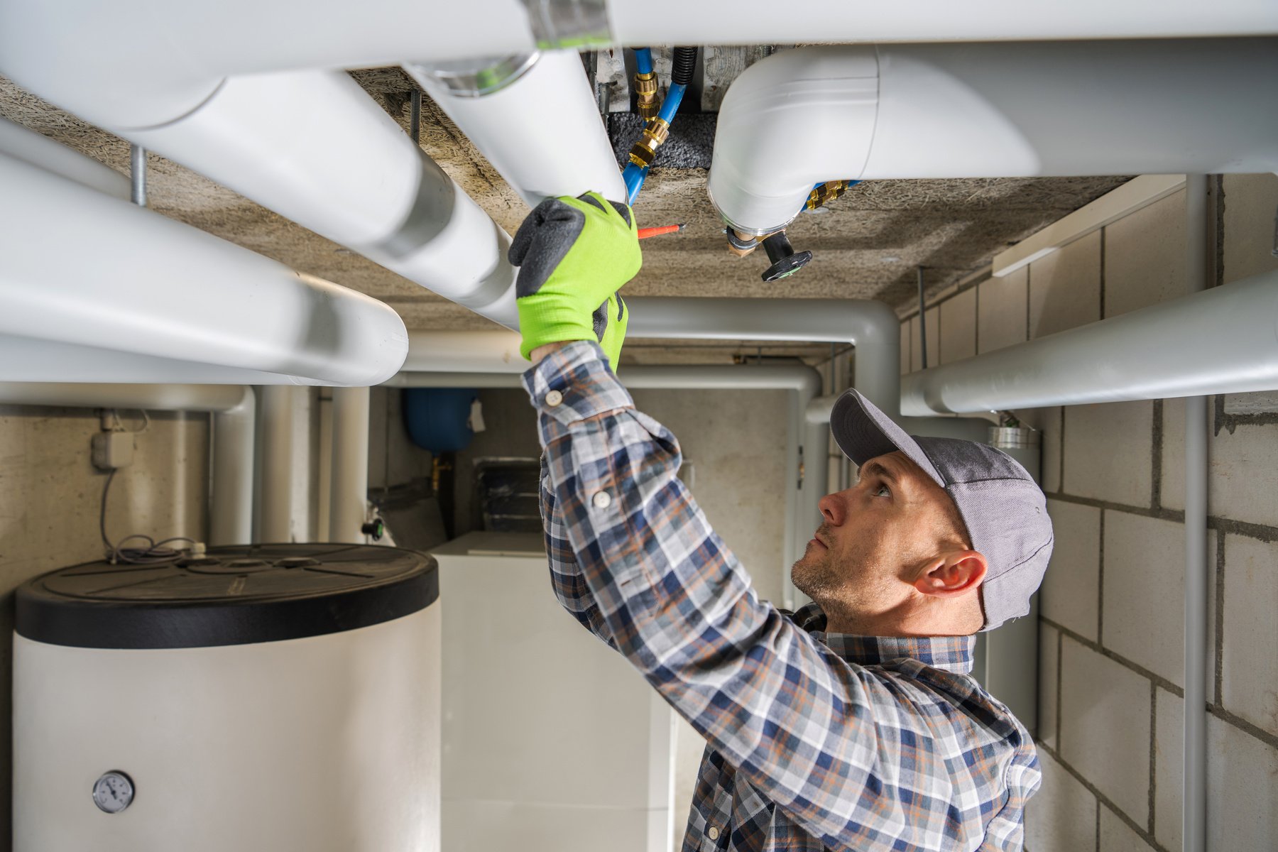 Plumbing Contractor Finishing Sanitary Pipeline Installation